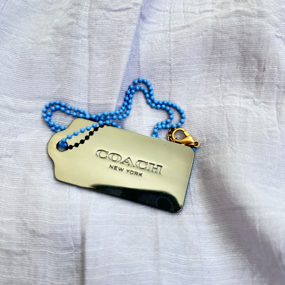 Coach metal tag necklace/bag charm